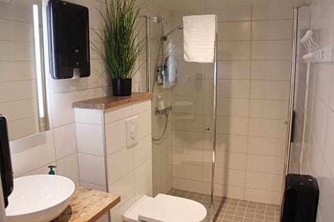 Basic Double Room, Shared Bathroom | Bathroom | Shower, hair dryer, towels