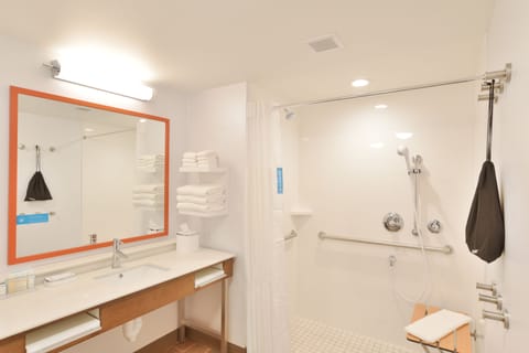 Studio, 1 King Bed, Accessible (Roll-In Shower) | Bathroom | Combined shower/tub, designer toiletries, towels