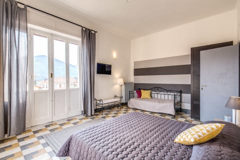 Triple Room, Shared Bathroom | Cribs/infant beds, free WiFi
