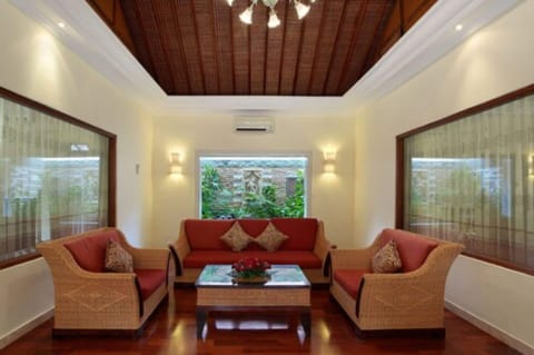 Two Bedroom Pool Villa | Living room | 20-inch LED TV with cable channels, TV