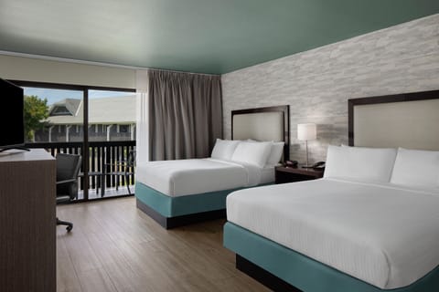 Premium Room, 2 Queen Beds, Balcony, Pool View | Hypo-allergenic bedding, in-room safe, desk, laptop workspace