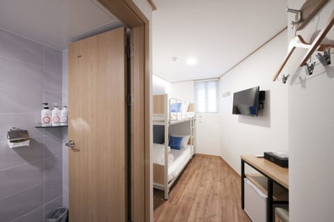 Twin Room (Bunk Twin Room) | Bathroom | Shower, free toiletries, hair dryer, slippers