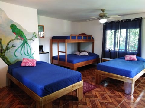 Family Room, Multiple Beds, Garden View | In-room safe, free WiFi, bed sheets