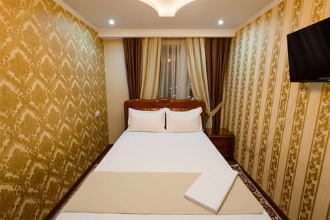 Luxury Room, 2 Bedrooms | Minibar, in-room safe, desk, soundproofing