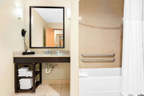 King Accessible Suite (Roll-In shower / First Floor) | Bathroom | Combined shower/tub, deep soaking tub, free toiletries, hair dryer