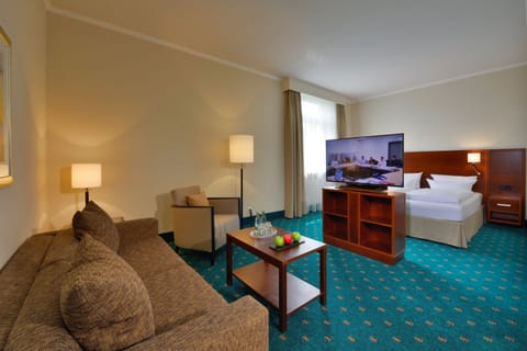 Superior Double Room | Living area | 41-inch flat-screen TV with cable channels, TV, tablet