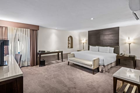 Habitación Gran Clase Cama King Size | Premium bedding, minibar, in-room safe, desk