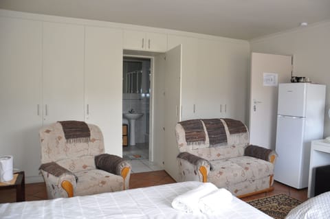 Quadruple Room (First Floor) | Bathroom | Shower, free toiletries, hair dryer, towels