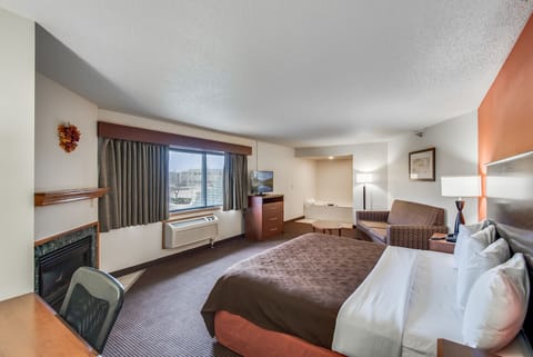 Premier Suite, 1 King Bed, Non Smoking, Fireplace | In-room safe, desk, laptop workspace, blackout drapes