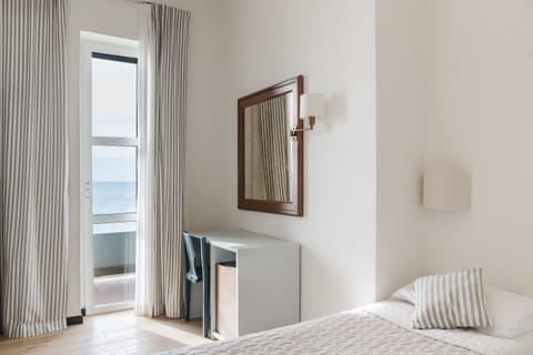 Superior Room, Balcony, Sea View | Minibar, desk, free WiFi, bed sheets