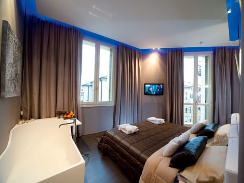 Luxury Suite, 1 Bedroom, Balcony | Frette Italian sheets, premium bedding, down comforters