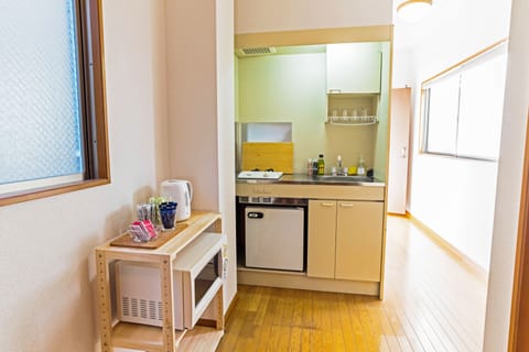 10 bed rooms for family | Private kitchenette | Fridge, microwave, stovetop, electric kettle