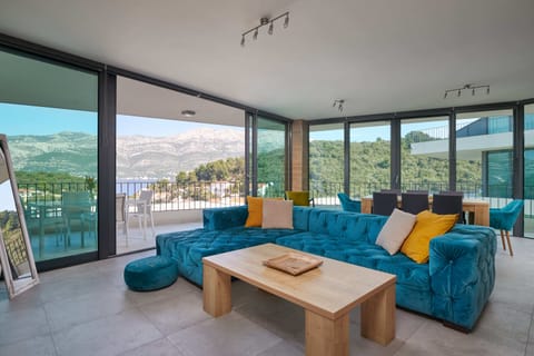 Deluxe Apartment, 2 Bedrooms, Terrace, Sea View (Green Hill 4) | Living area | 140-cm flat-screen TV with satellite channels, TV, Netflix