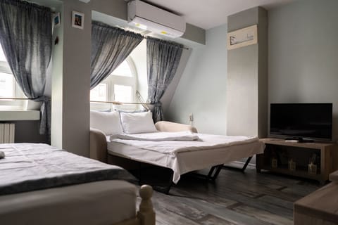 Superior Triple Room, 1 Queen Bed with Sofa bed, Garden View | Blackout drapes, iron/ironing board, free WiFi, bed sheets