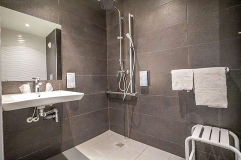 Shower, eco-friendly toiletries, hair dryer, towels