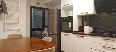 Deluxe Apartment, 2 Bedrooms | Private kitchen | Fridge, microwave, oven, stovetop