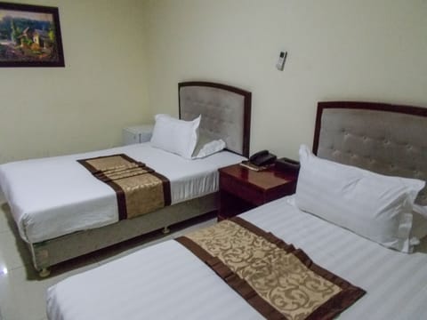 Twin Room, Garden View | In-room safe, individually decorated, individually furnished, desk