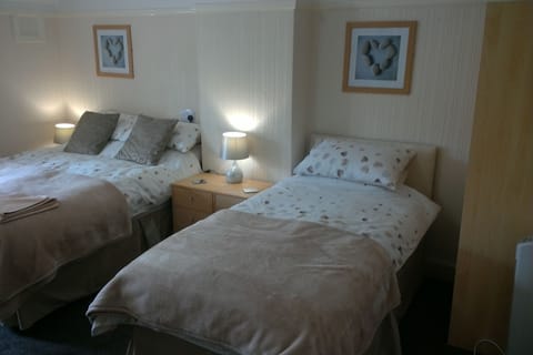 Family Double or Twin Room, Multiple Beds | Individually decorated, individually furnished, free WiFi, bed sheets