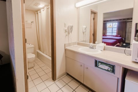 Standard Room, 2 Queen Beds | Bathroom | Combined shower/tub, free toiletries, hair dryer, towels