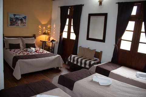 Standard Quadruple Room | Premium bedding, minibar, iron/ironing board, free WiFi