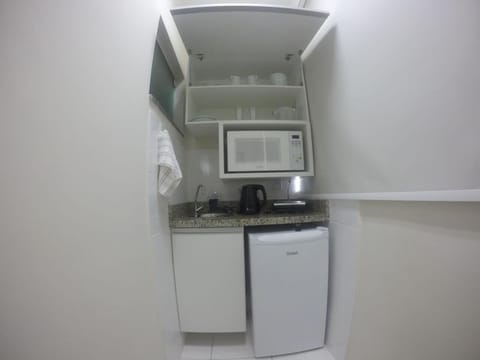 Microwave, coffee/tea maker, electric kettle, cookware/dishes/utensils