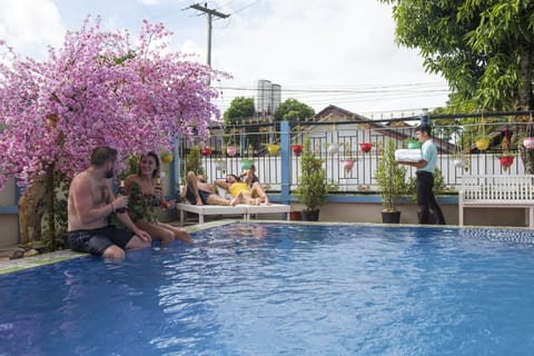 Outdoor pool, pool umbrellas, sun loungers