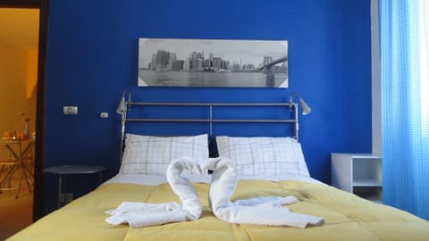 Apartment, 1 Bedroom | Frette Italian sheets, premium bedding, minibar, in-room safe