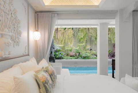 The Waterfall Pool Suite | Premium bedding, free minibar, in-room safe, blackout drapes