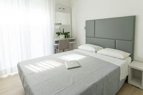 Double or Twin Room, Balcony | In-room safe, desk, iron/ironing board, free WiFi