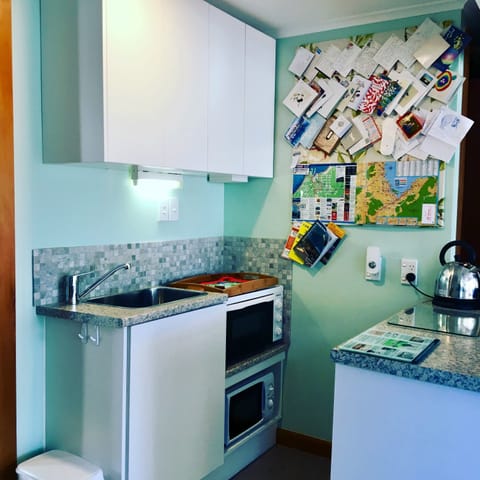 Superior Apartment, 1 Bedroom, Garden View (The Garden Apartment ) | Private kitchen | Full-size fridge, microwave, oven, stovetop