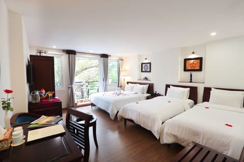 Family Room, Balcony, City View | Premium bedding, minibar, in-room safe, desk