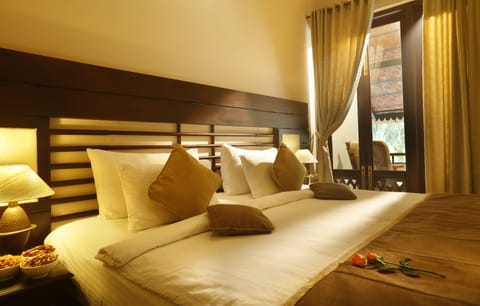 Premium Suite | Premium bedding, minibar, in-room safe, individually furnished