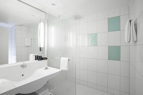 Eco-friendly toiletries, hair dryer, towels, soap