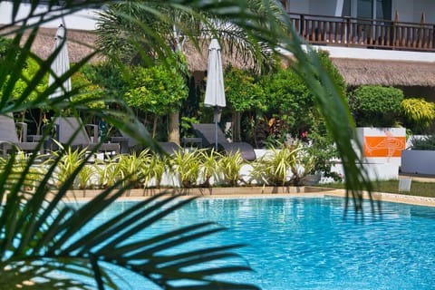 Outdoor pool, open 7 AM to 9:30 PM, pool umbrellas, sun loungers