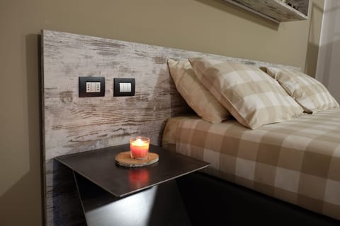 Comfort Quadruple Room | Down comforters, memory foam beds, in-room safe, individually furnished