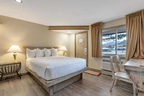 Economy Room, 1 Queen Bed (some pet friendly) | Premium bedding, down comforters, in-room safe, individually decorated