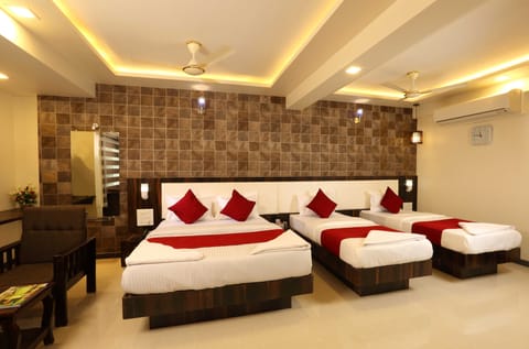 Family Quadruple Room, 1 Bedroom, Private Bathroom | Premium bedding, minibar, in-room safe, individually decorated