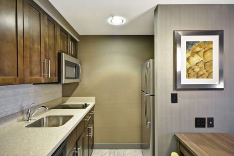 Suite, 1 Bedroom, Non Smoking | Private kitchen | Fridge, microwave, stovetop, dishwasher