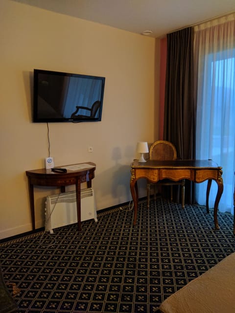 Desk, blackout drapes, soundproofing, iron/ironing board