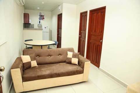 Triple Room | Living area | Flat-screen TV