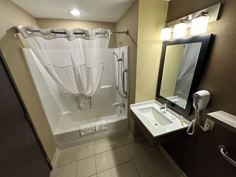 Combined shower/tub, hair dryer, towels, soap