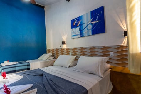 Standard Triple Room | Minibar, iron/ironing board, free WiFi