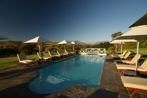 2 outdoor pools, pool umbrellas, sun loungers