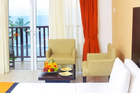 Deluxe Room, Sea View | Memory foam beds, in-room safe, desk, rollaway beds