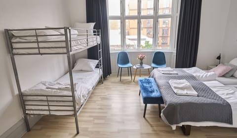 Family Quadruple Room, 1 Bedroom | Iron/ironing board, free WiFi, bed sheets