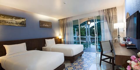 Deluxe Twin Pool Access | In-room safe, desk, blackout drapes, free WiFi