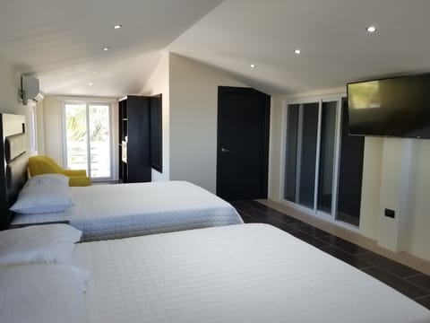 Deluxe Triple Room, 2 Bedrooms, 2 Bathrooms, Pool View | Premium bedding, free WiFi