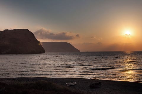 Beach nearby, black sand, 9 beach bars