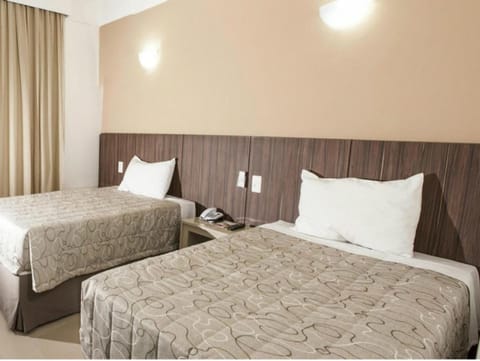 Triple Room | Minibar, desk, blackout drapes, free WiFi