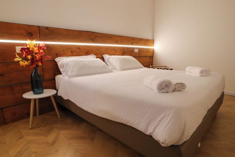 Superior Double or Twin Room | Living area | Flat-screen TV